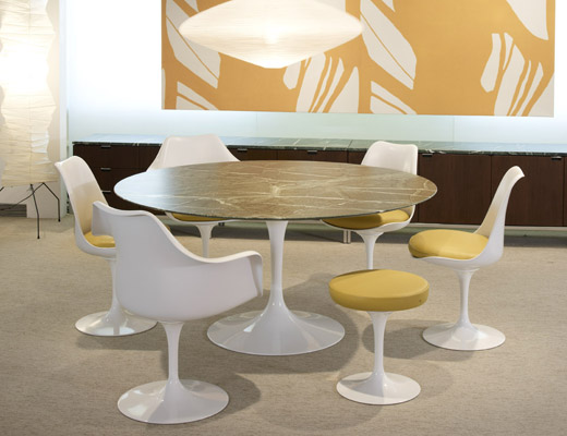 Saarinen Tulip Table and yellow Tulip chairs and stools