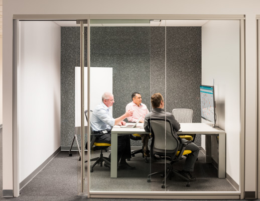 Knoll Reff Profiles meeting table and media enclave with grey and yellow ReGeneration ergonomic chairs